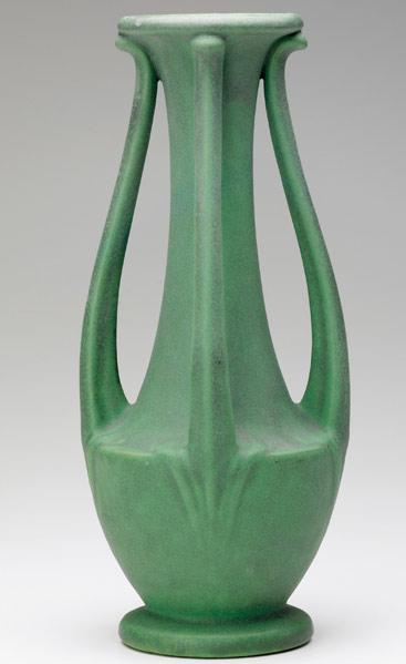 Appraisal: TECO Four-handled urn in matte green glaze with charcoaling Stamped