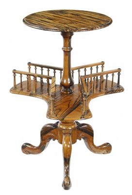 Appraisal: An early Victorian calamander tripod book stand with a circular