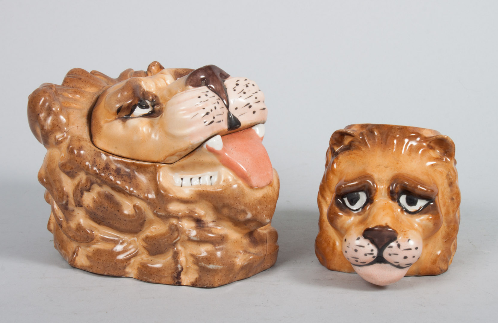 Appraisal: Two Austrian ceramic lion tobacco jars early th century large