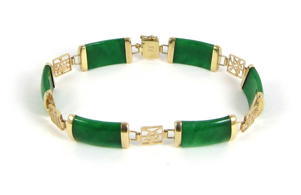 Appraisal: GREEN JADE AND FOURTEEN KARAT GOLD BRACELET measuring - in