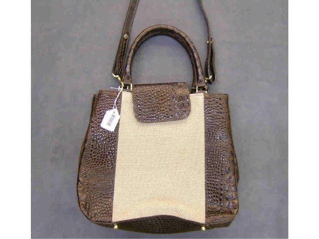 Appraisal: Dooney amp Bourke handbag with brown leather and tweed fabric