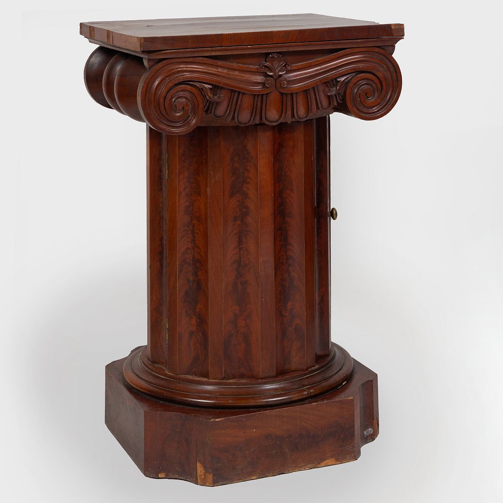 Appraisal: English Mahogany Columnar Form Washstand The cupboard fitted with one