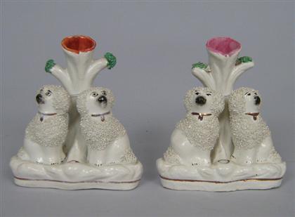 Appraisal: Pair of Staffordshire vases Each modeled as a pair of