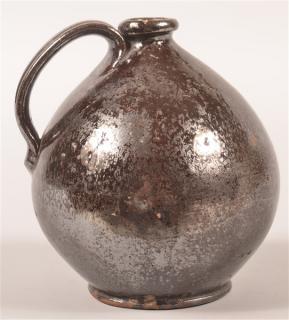 Appraisal: PA th Century Redware Manganese Glazed Jug Pennsylvania th Century