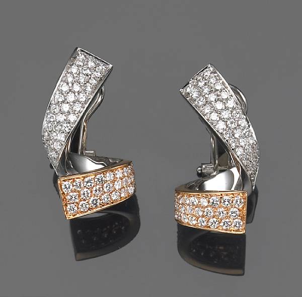 Appraisal: A pair of diamond and k bicolor gold clip-earrings estimated