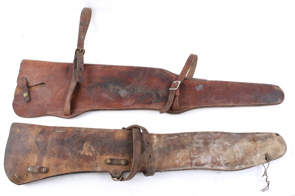 Appraisal: Pair of Western Leather Rifle Saddle Scabbards Included in this