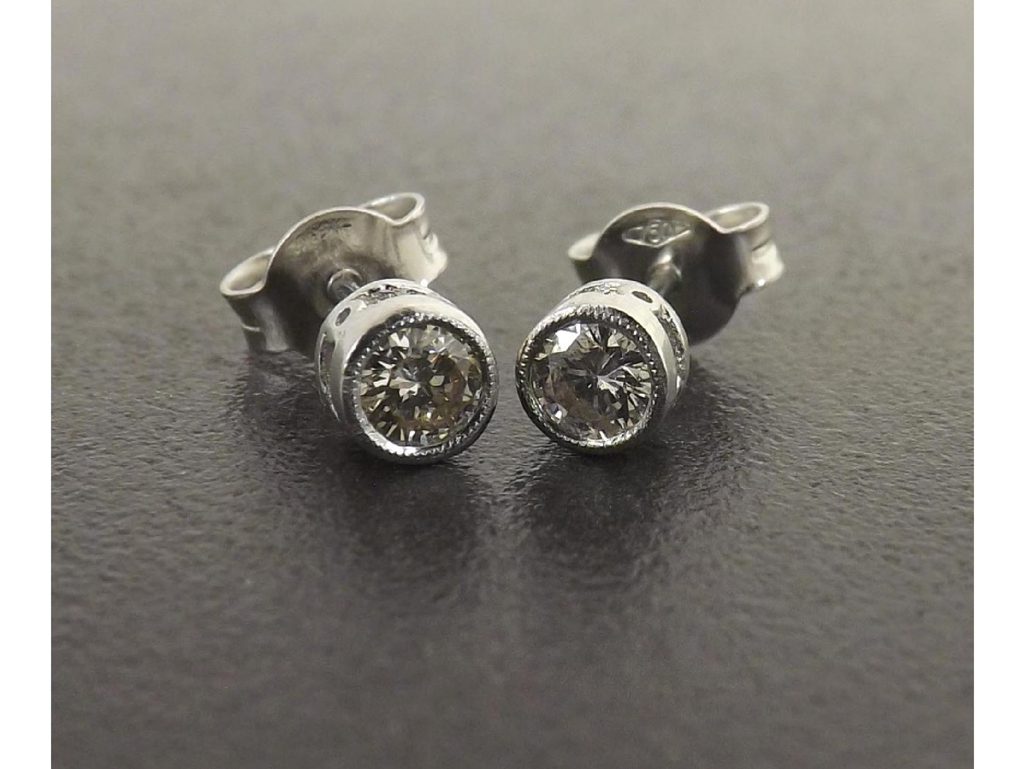 Appraisal: Pair of ct white gold diamond ear studs round brilliant-cut