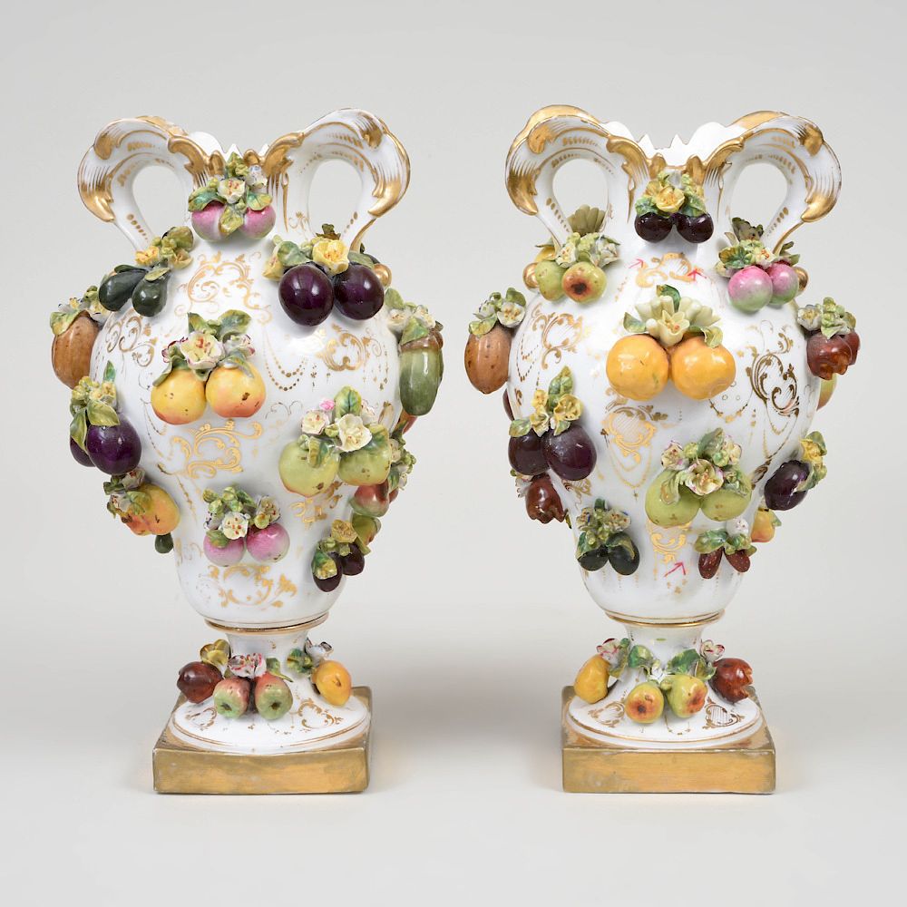 Appraisal: Pair of Continental Porcelain Fruit and Flower Encrusted Vases in