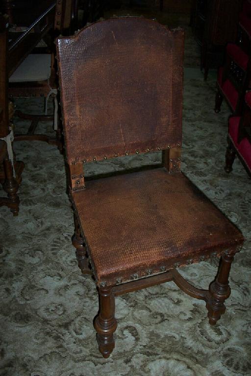 Appraisal: A set of twelve late th century walnut dining chairs