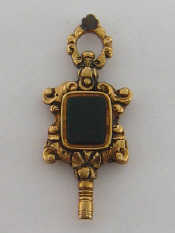 Appraisal: A Regency chased yellow metal and blood stone watch key