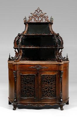 Appraisal: Rococo revival rosewood tag re three-tiered carved rosewood and mirrored