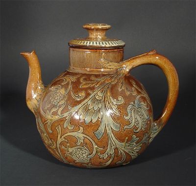 Appraisal: A Martin Brothers stoneware teapot and cover ovoid incised with