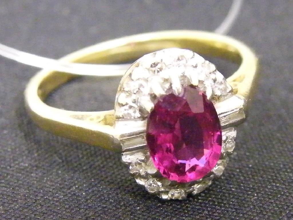 Appraisal: ct ruby and diamond oval cluster ring in a white