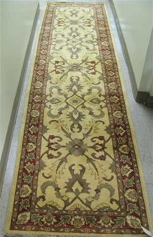 Appraisal: HAND KNOTTED ORIENTAL RUNNER Pakistani Persian overall red green and