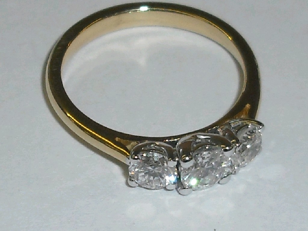 Appraisal: ct three stone brilliant cut three stone diamond ring ct