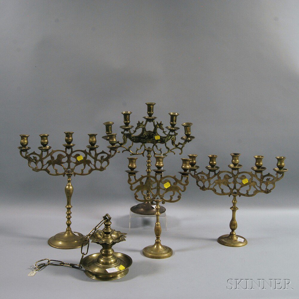 Appraisal: Five Judaic Brass Lamps three five-branch candelabra and a three-branch