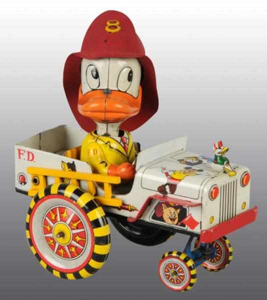 Appraisal: Tin Linemar Disney Donald Duck Fireman Car Toy Description Japanese