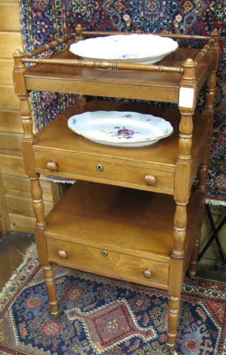 Appraisal: VICTORIAN STYLE WALNUT WHAT-NOT STAND American early th century The