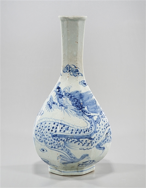 Appraisal: Korean blue and white porcelain octagonal vase depicting a dragon