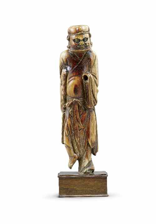 Appraisal: A Chinese ivory figure of Li Tieguai the ivory patinated