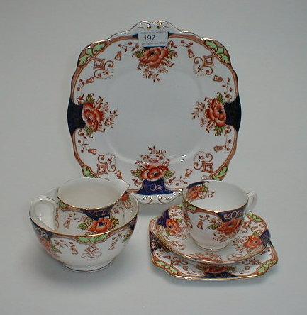 Appraisal: An English bone china tea service printed in brown and