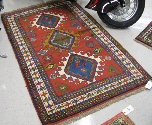 Appraisal: TWO HAND KNOTTED ORIENTAL AREA RUGS Indo-Persian very similar three-medallion