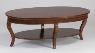 Appraisal: Oval coffee table with lower shelf l Contemporary low table