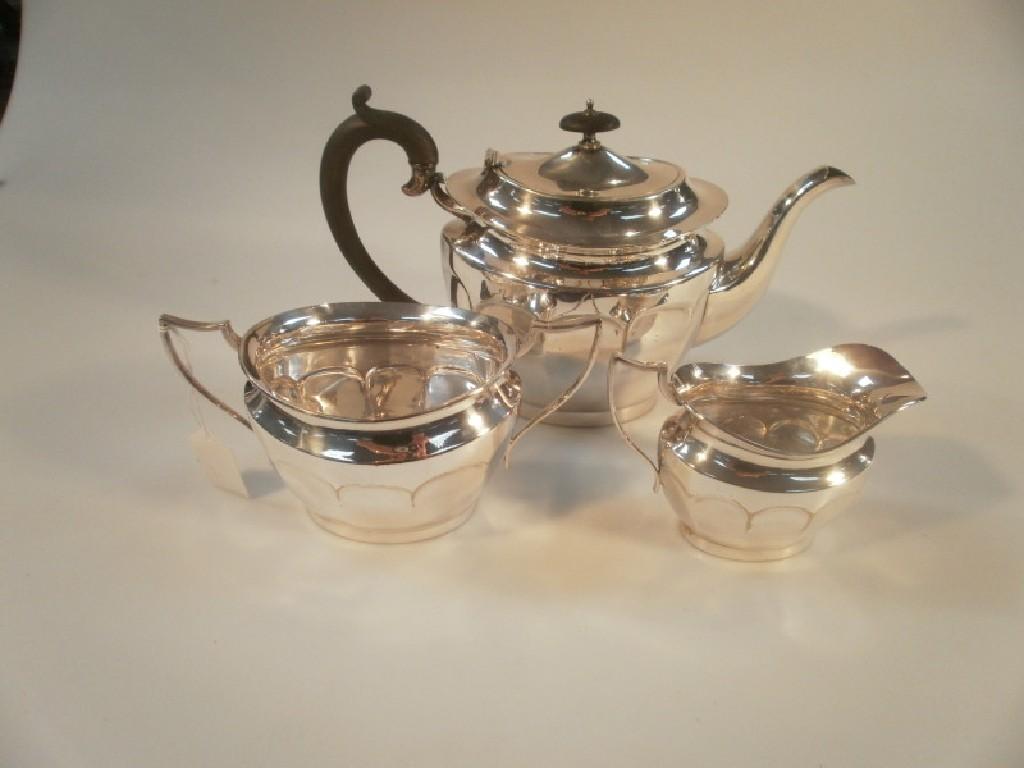 Appraisal: An EPNS silver plated three piece tea service the teapot