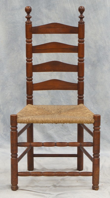 Appraisal: Wallace Nutting ladderback rush seat side chair slat sausage turnings