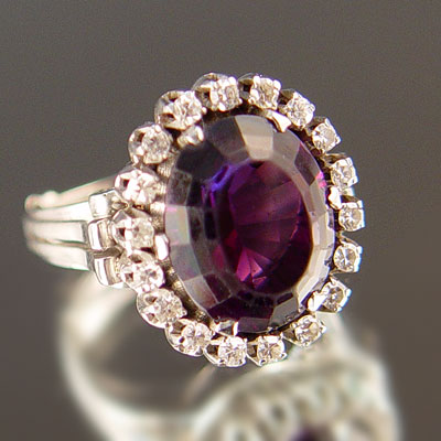 Appraisal: A Ct AMETHYST RING CIRCLED IN Ctw OF DIAMONDS K