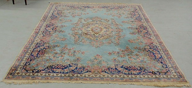 Appraisal: Kerman oriental carpet light blue field and overall floral patterns