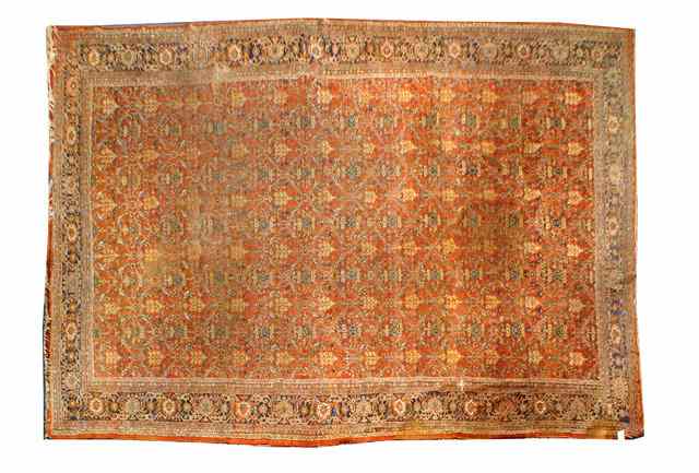 Appraisal: A PERSIAN CARPET the central field filled with chains of