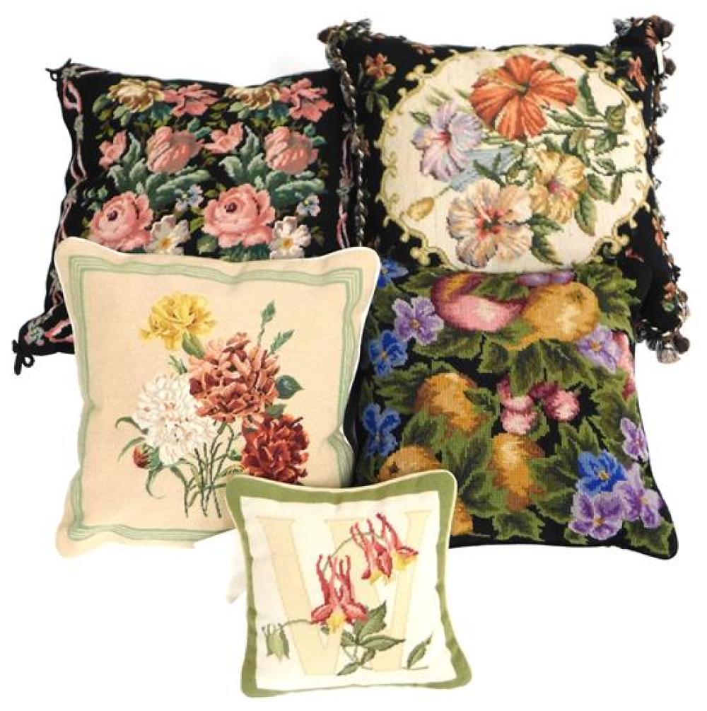 Appraisal: Needlepoint pillows five pieces floral motif several on black ground