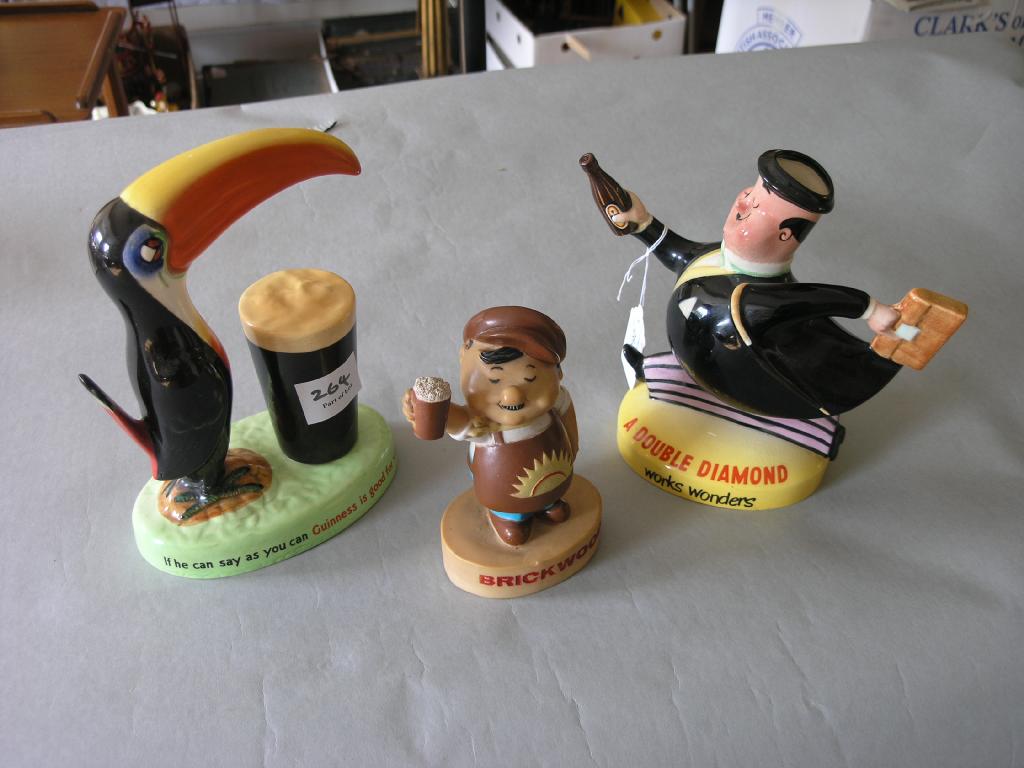 Appraisal: A Carltonware Guinness advertising model toucan standing beside a filled