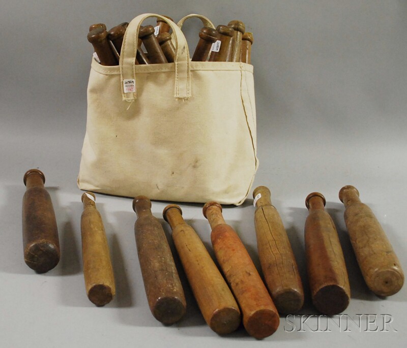 Appraisal: Twenty-two Turned Hardwood Clubs in a canvas bag