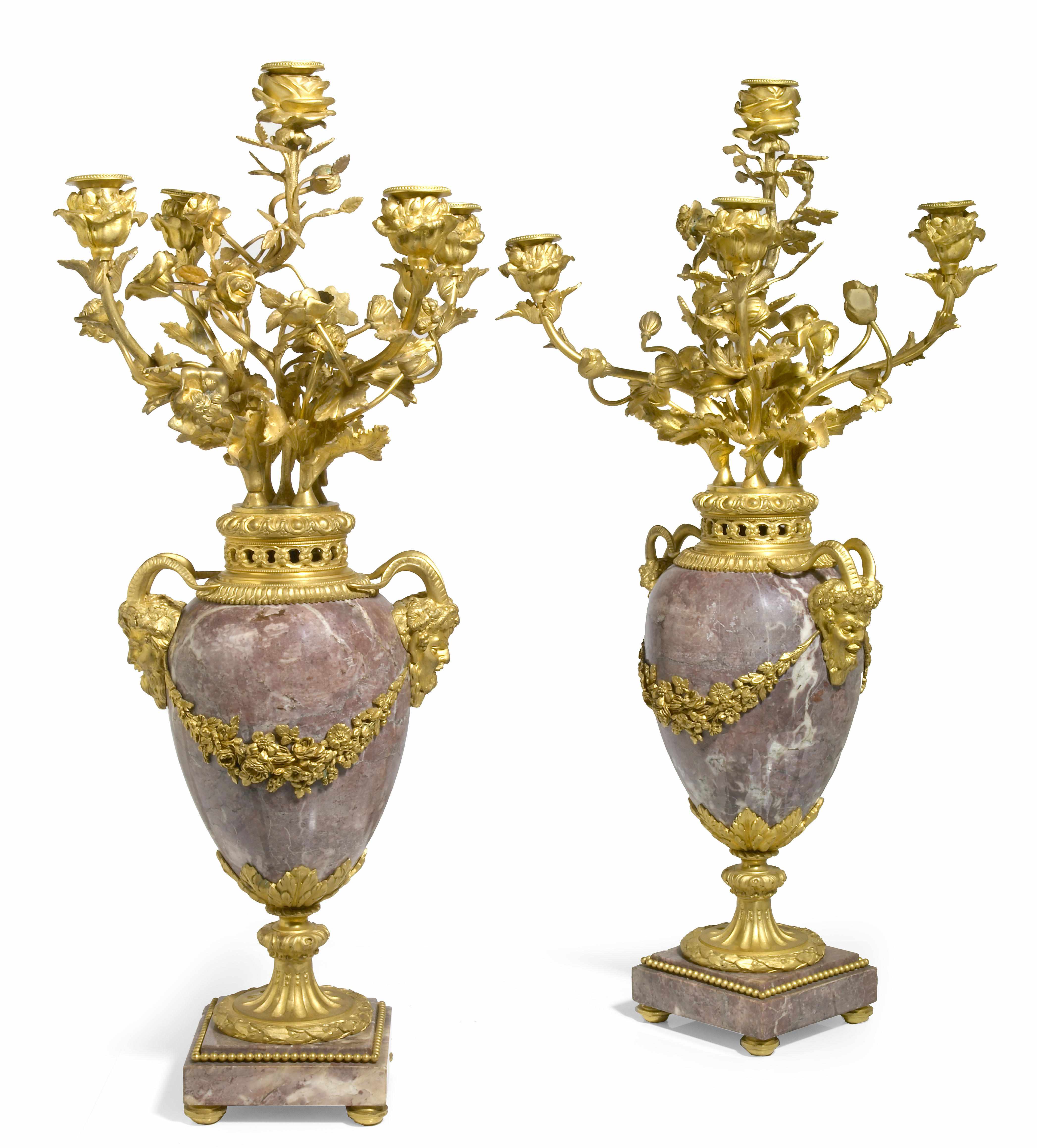 Appraisal: A pair of Louis XVI style gilt bronze and marble