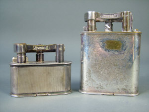 Appraisal: A large Dunhill silver-plated lighter of flip top action and