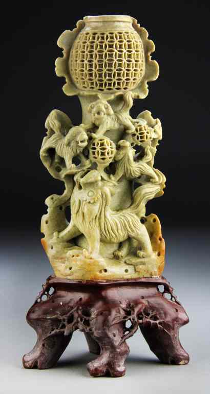 Appraisal: Large Chinese Soapstone Carving on StandFinely carved to depict foo