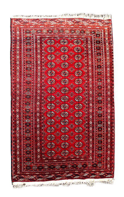 Appraisal: AN AFGHAN BOKHARA RED GROUND RUG with a multiple banded