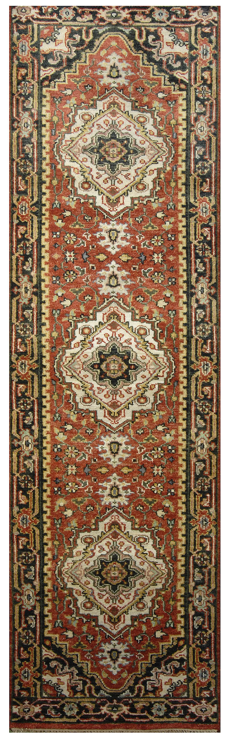 Appraisal: ORIENTAL RUG SERAPI-DESIGN RUNNER ' x ' Three ivory medallions