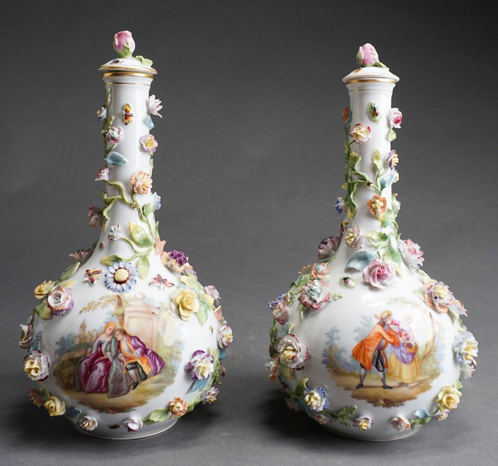 Appraisal: Pair Dresden 'Carl Thieme' Floral Encrusted Amorous Painted Porcelain Covered