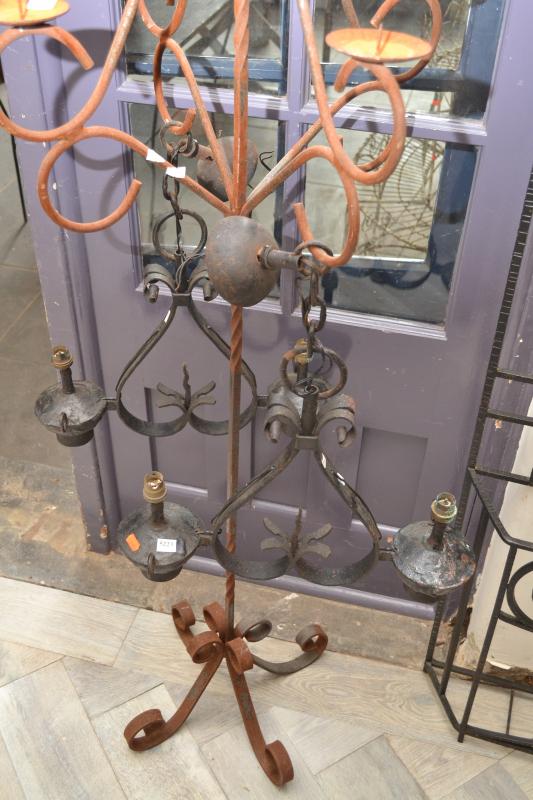 Appraisal: A PAIR OF FRENCH WROUGHT IRON ELECTRIFIED CEILING LIGHTS A