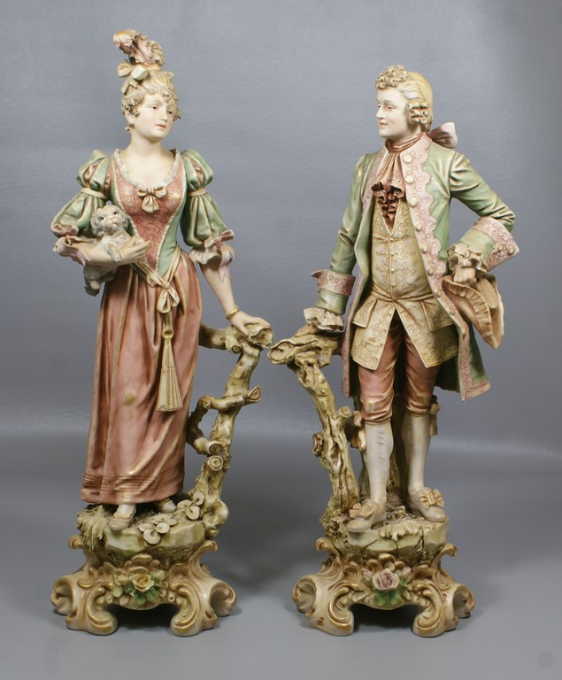 Appraisal: Pr Royal Dux Bohemia matte finished porcelain figurines elegant lady