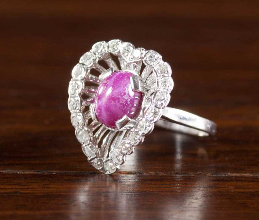 Appraisal: STAR RUBY DIAMOND AND FOURTEEN KARAT GOLD RING The white