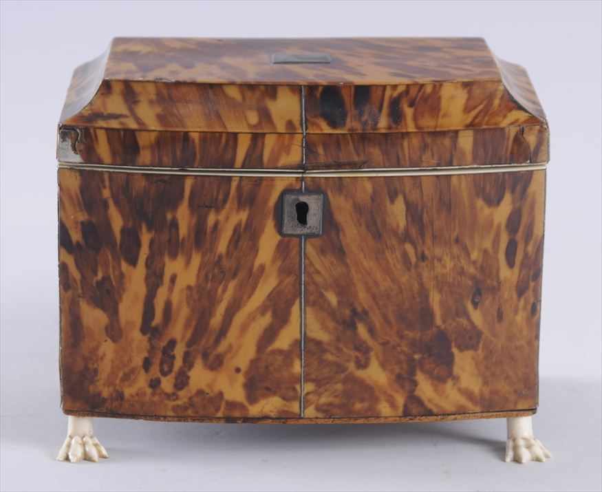 Appraisal: REGENCY PEWTER AND IVORY-MOUNTED TORTOISESHELL BOW-FRONT TEA CADDY The hinged