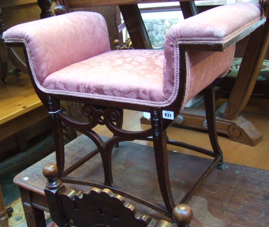 Appraisal: An Edwardian gilt metal mounted dressing stool upholstered in pink