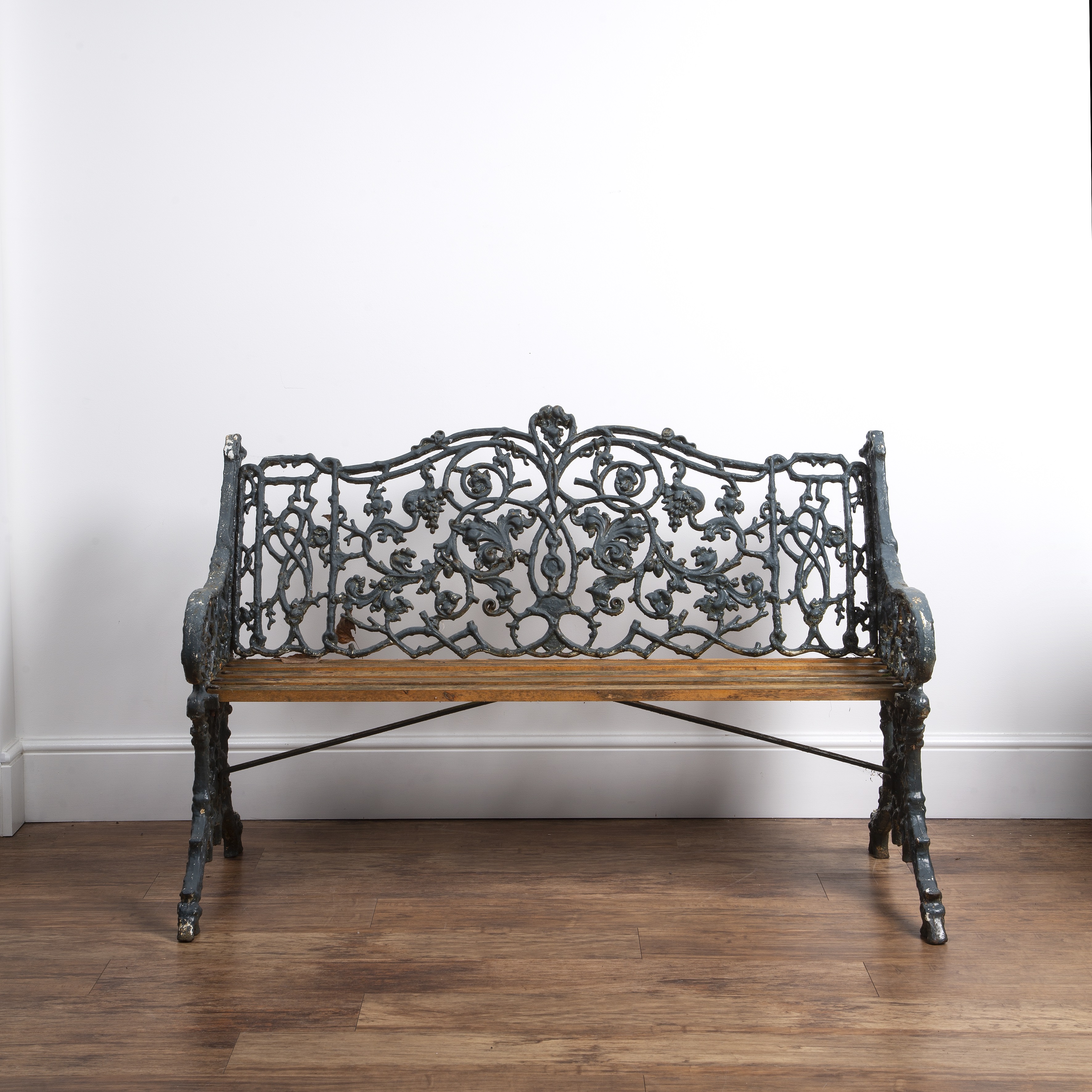 Appraisal: Cast iron garden bench th Century in the Coalbrookdale 'rustic