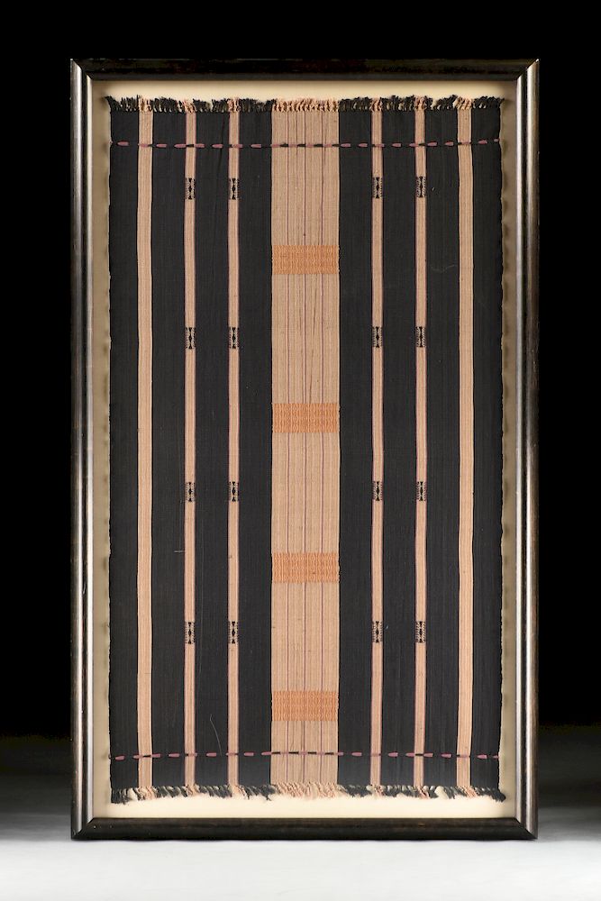 Appraisal: A NAGA FINELY LOOMED BLACK AND TAN STRIPED COTTON WOMAN'S