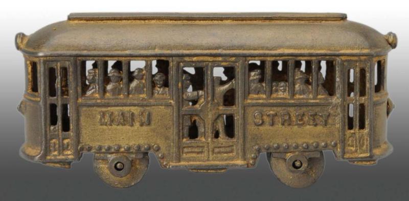 Appraisal: Cast Iron Main Street Trolley Still Bank Description Manufactured by