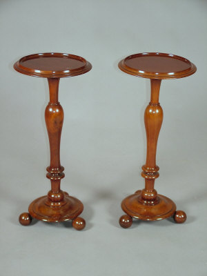 Appraisal: A pair of Victorian mahogany wine tables with circular dished